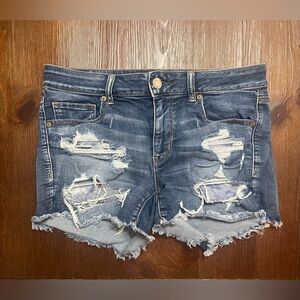 Women’s Medium Wash Super Stretch Midi Cut Off Denim Shorts Size 12